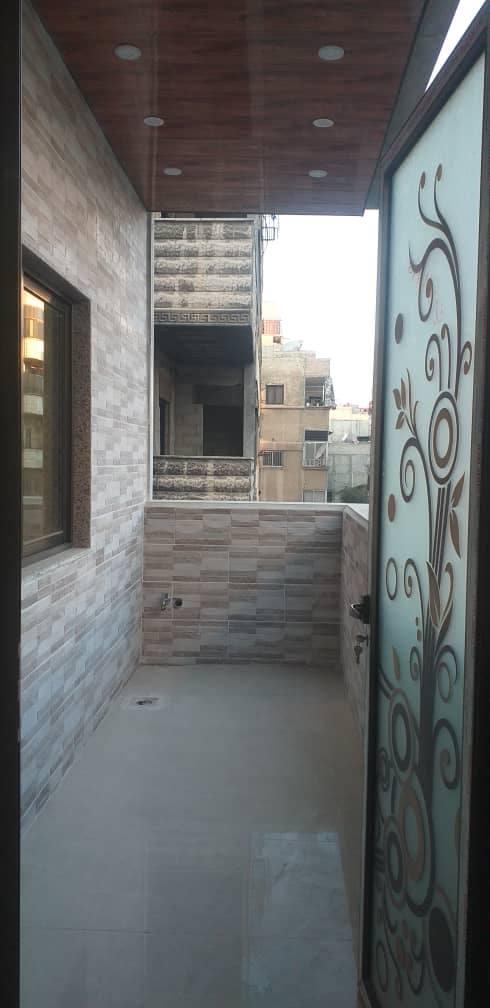 للبيع شقة ببيلا فوق سنتر الصلطان  طابق تاني شرقي شمالي