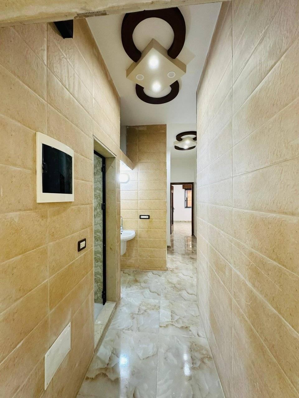 منزل للبيع شقة طابق ثاني فني واجهة في معضمية الشام