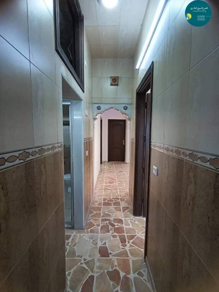 للبيع شقة زاوية في حماة القصور نزلة جامع اديب